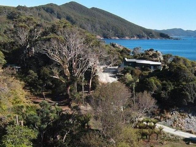 Secluded Coastal Retreat with Breath Taking Views on Acreage