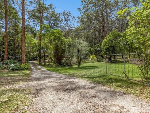 Secluded Coastal Sanctuary Expansive 4 Bedroom, 2 Bathroom Retreat in Arakoon Surrounded by Pristine Bushland