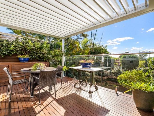 Secluded full brick semi offers sunny entertaining