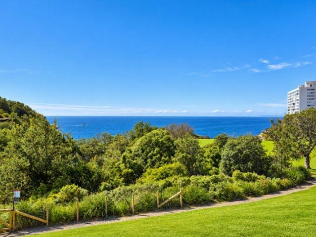 Secluded Parkside Living with Ocean Views, Balcony, Garage and Storage