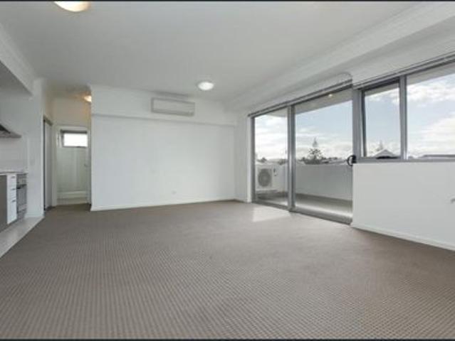 Second Floor Beachside Apartment with Large Balcony and Secure Parking Unfurnished