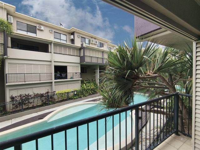 Second floor pool view single level unit City Waters