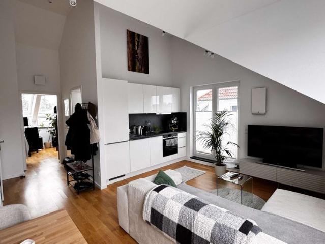 SEEBAUER | helle moderne Dachterrassen Traumwohnung in Untermenzing