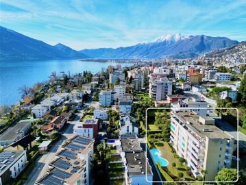Seeblick, viel Platz und Schwimmbad elegante Wohnung in Minusio