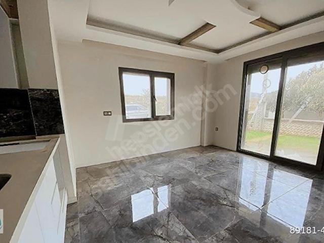 SEFERİHİSAR DA BAHÇELİ 2+1 SATILIK SIFIR FIRSAT DAİRE