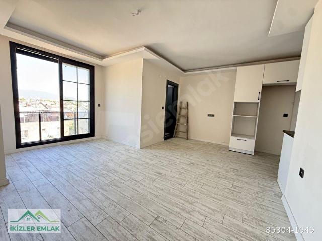Seferihisar doğanbeyde satılık 1 + 1 deniz tarafında satılık daire