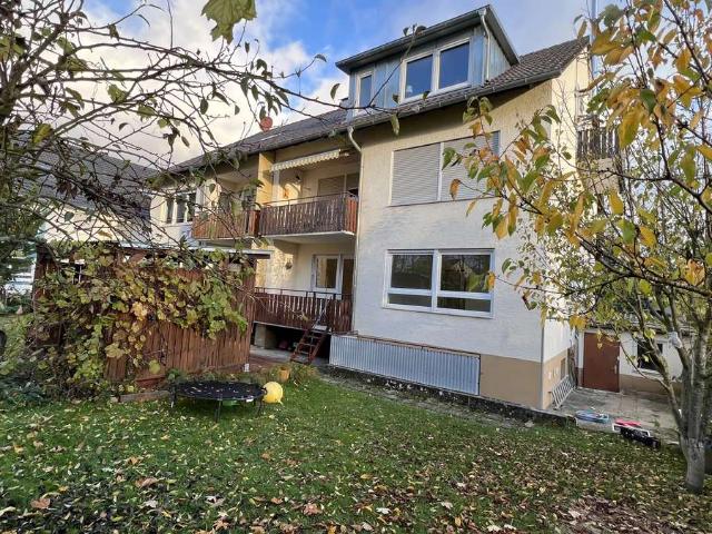 Sehr gepflegte lichtdurchflutete 3 Zimmer Wohnung mit Garten, Garage und sonniger Südterrasse