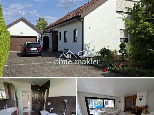 Sehr gepflegtes Zweifamilienwohnhaus in ruhige Wohnlage mit großem, sonnigem Gartengrundstück