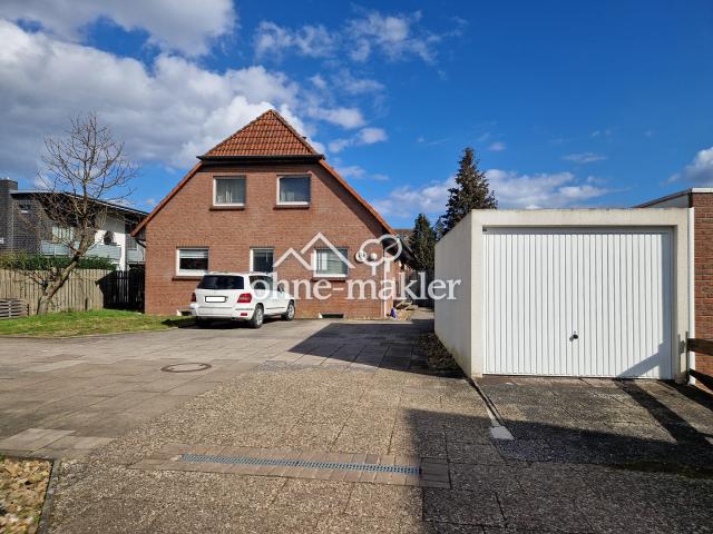 Seltene Gelegenheit in Holtorf: Großzügiges Zweifamilienhaus mit Terrasse und Garage