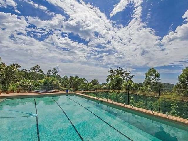 Serene Family Home with Expansive Hinterland Views