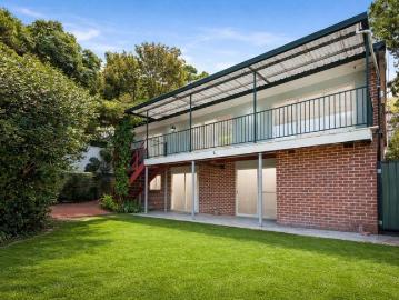 Split Level Family Retreat with Creekside Outlooks & Offering Endless Future Potential