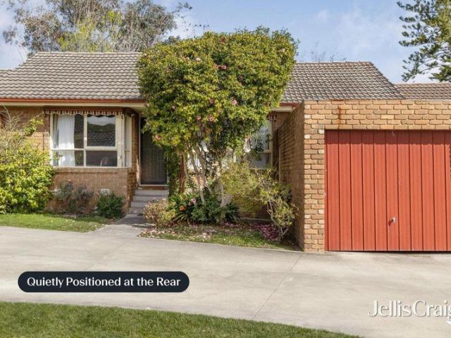Serene rear garden position in convenient locale