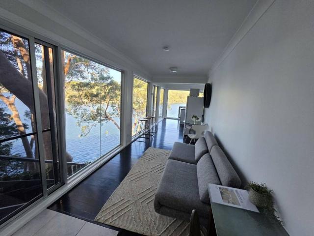 Serene Waterfront Sanctuary with 360 Degree Water Views Fully Furnished 1 Bed Studio