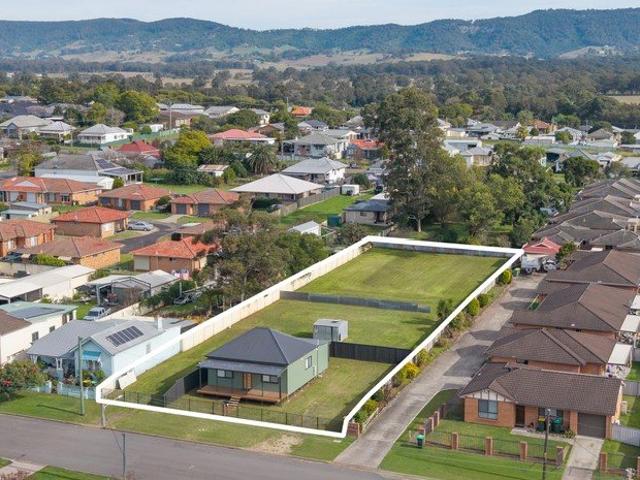 Serious Development Opportunity with Renovated 4 Bedder at Front
