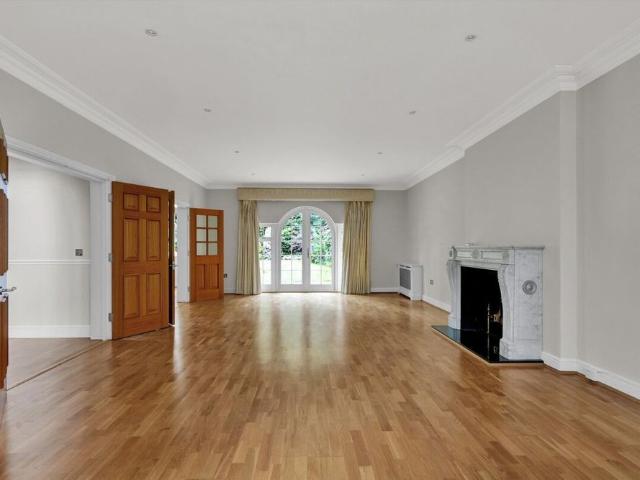 Set behind electric gates, this spacious six bedroom detached family home is situated on a sought after private road on the slopes of St Georges Hill