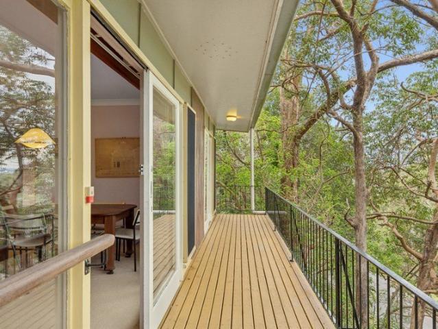 Set high and nestled amongst the trees and nature, 24 Greer Street, Bardon, is ready for its next exciting chapter