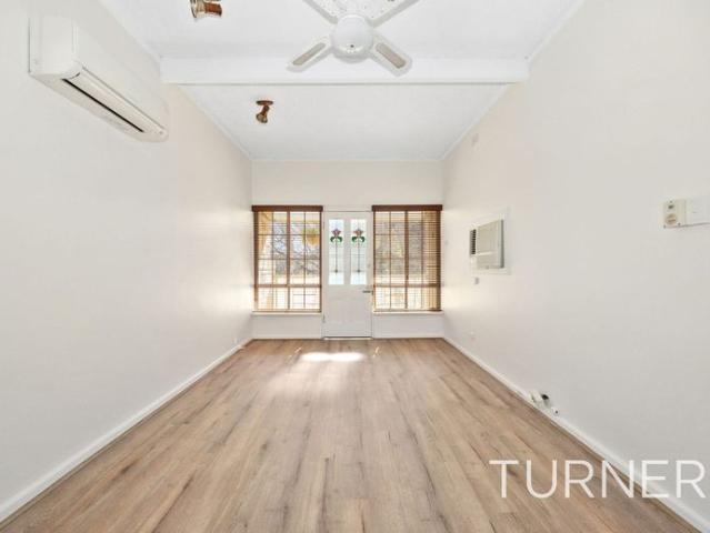 SET IN A TREE LINE STREET CLOSE TO CBD