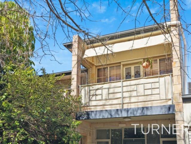 SET IN A TREE LINE STREET CLOSE TO CBD