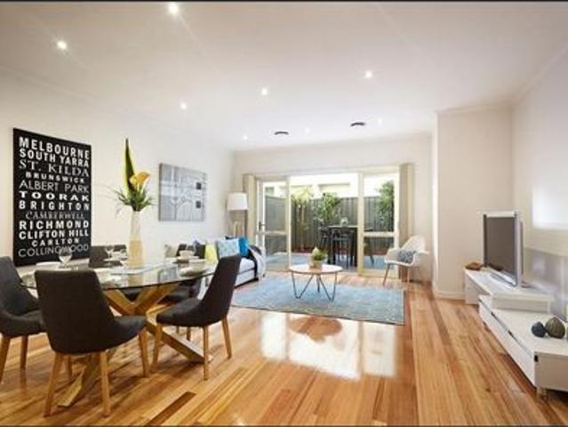 Set in a quiet Richmond streetscape
