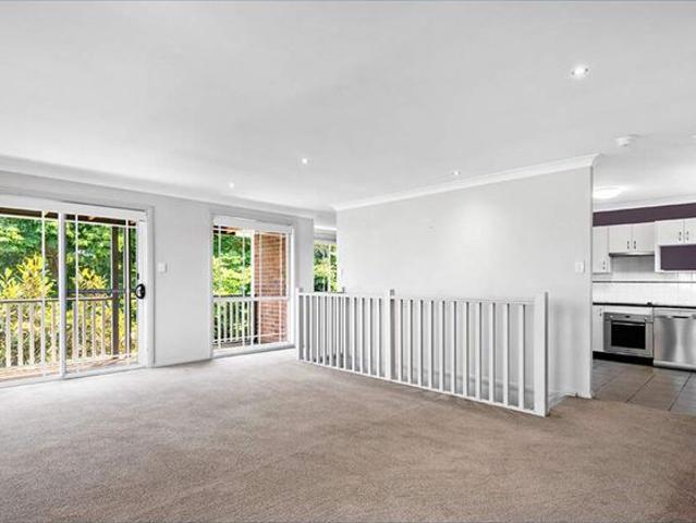 Set in a small complex in a popular downtown area is this low maintenance two bedroom townhouse conveniently close to the main street