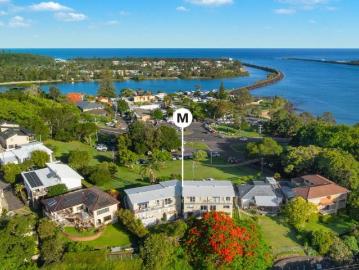 Seven apartments on one title, with Medium Density zoning and water views