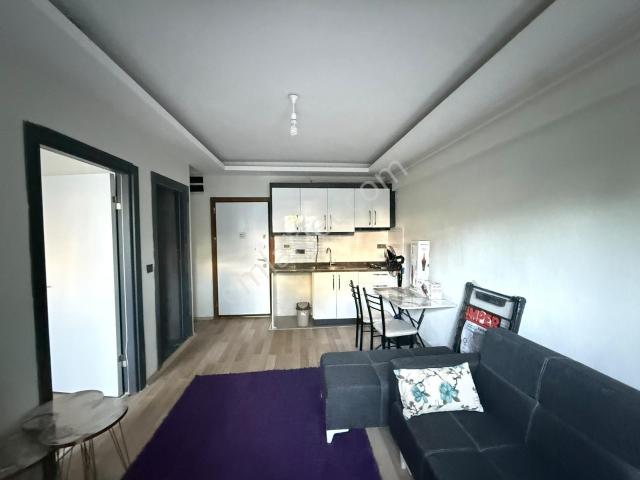 Seyrekte Muhteşem Konumda Bahçeli Eşyalı Kiralık 1+1 Daire
