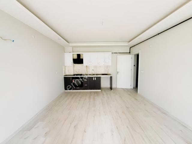 Seyrek'de 2+1 Eşyasız Bahçeli Kiralık Daire