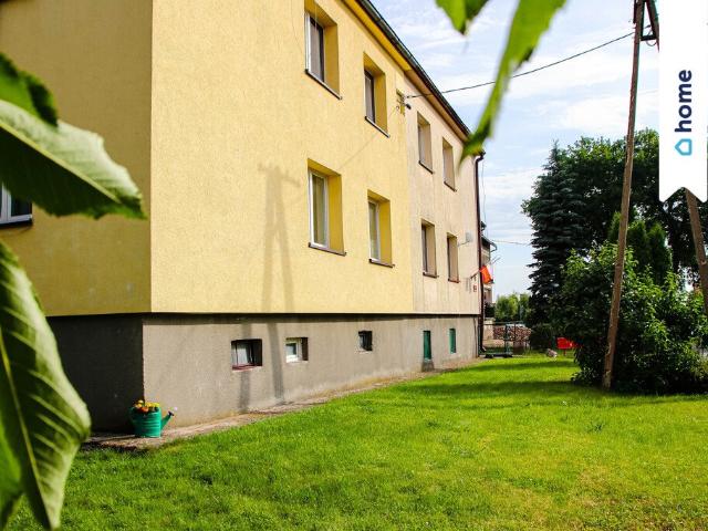 Zapraszam do 48 m² mieszkania z ogródkiem i garażem w Łąsku Wielkim