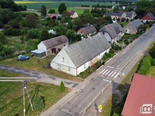 Skrajny szeregowiec 60 m2 z dużą działką i garażem
