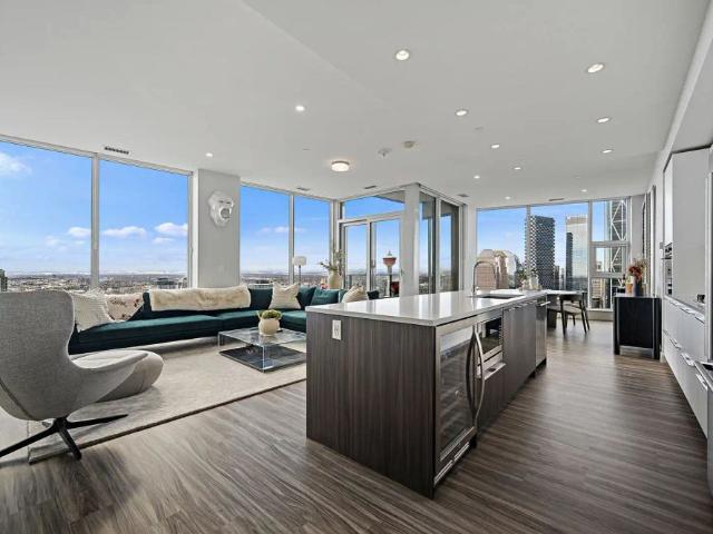 Sky High Luxury: Designer Penthouse, Iconic Views, Unmatched Amenities — 2 Bedrooms Condo Unit