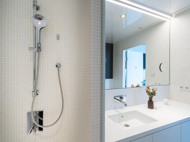 Sky High Serenity: Your Design Apartment in Vienna's Iconic Philips House, Vienna Amsterdam Apartments for Rent