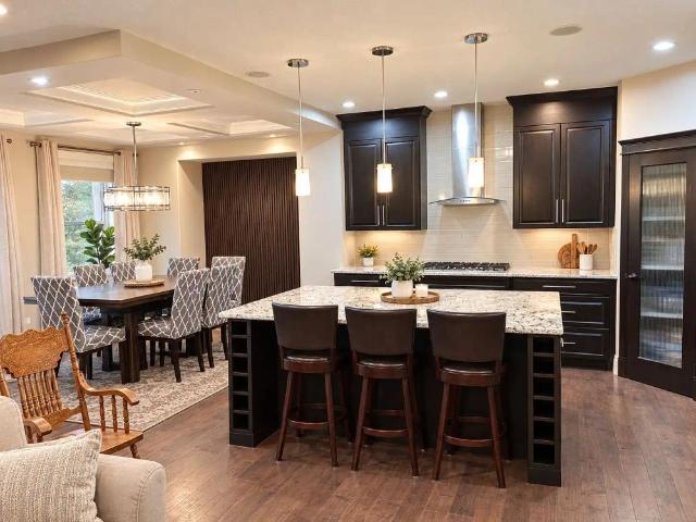 SHOWHOME BACKING UP ONTO TRAIL — 4 Bedrooms+ Den House