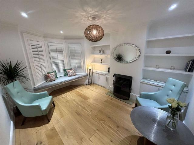 Short Let All Bills Included: A period property offering a stunning contemporary interior with garden studio and off street parking