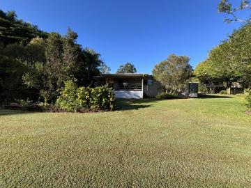 SHADY ACRE WITH LARGE FAMILY HOME