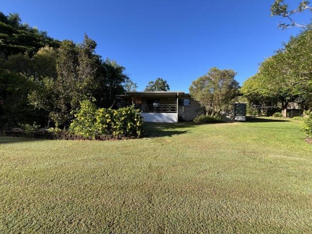 SHADY ACRE WITH LARGE FAMILY HOME