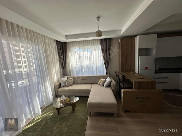 SİTE İÇERİSİNDE 2.KAT SIFIR EŞYALI GENİŞ BALKONLU 1+1
