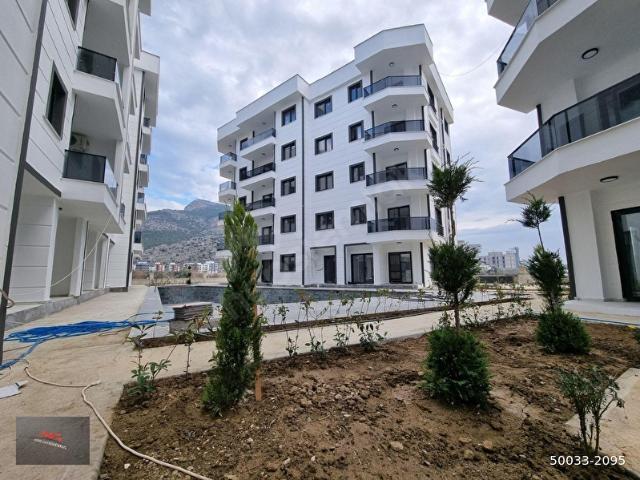 SİLİFKE YEŞİLOVACIKTA SATILIK SIFIR HAVUZLU 2+1 DAİRELER