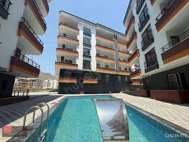 SİLİFKE YEŞİLOVACIK'TA SİTE İÇERİSİNDE SIFIR SATILIK DAİRE