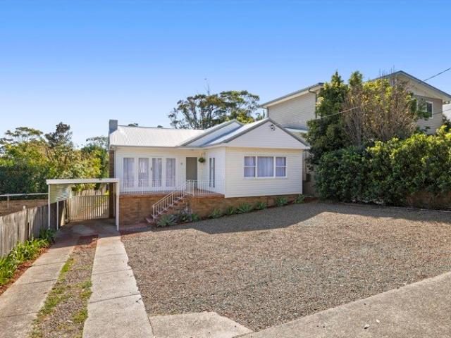 Single Level Cottage Charm with Bonus Approved Separate Second Residence on Rare 739 sqm Parcel