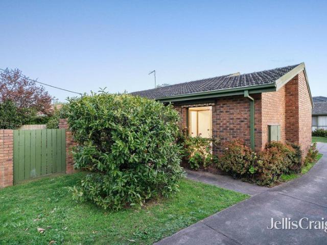 Single Level Ease with a Private Garden Setting