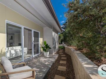 Single Level Ease, Custom Designed & Custom Built Entertainer's Delight with Big Deck & Drive Thru Garaging, Moments from Lake Macquarie