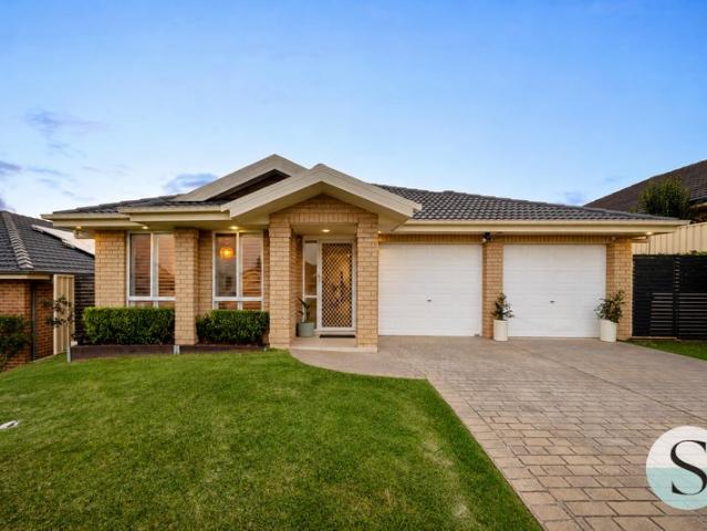 Single Level Family Living, Three Living Zones, Sheltered BBQ Entertaining, Deck Space, Double Garage, Putting Green, Fully Fenced