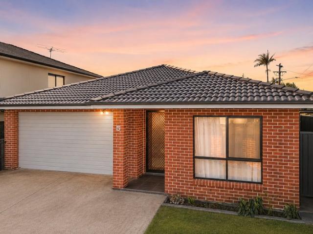 Near New Architectural Luxury in a Premier Setting