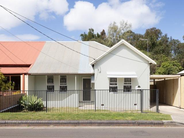 Single Level Home with riverfront proximity & future development potential