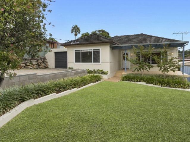 SINGLE LEVEL HOME FILLED WITH WARMTH AND ENDLESS POTENTIAL