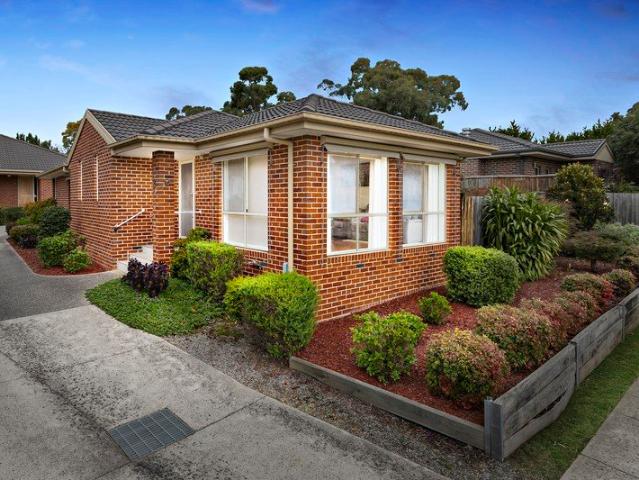 Elegant Single Level Living in a Peaceful Setting
