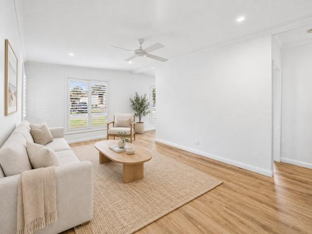 Single Level Living, Spacious Backyard and Rear Lane Access