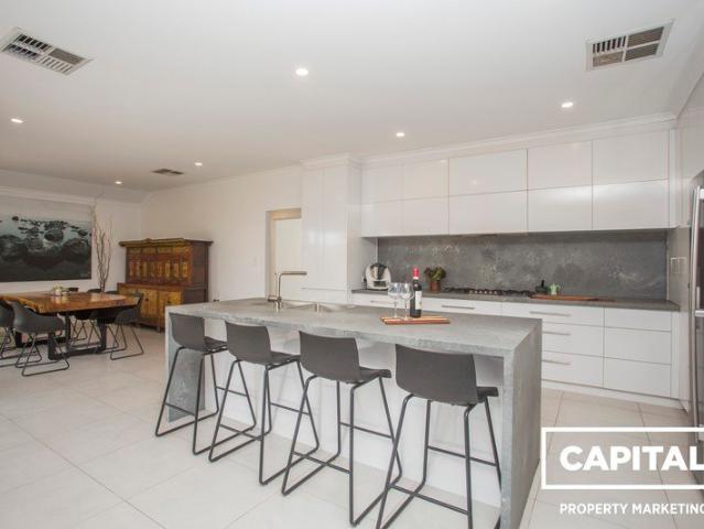 Single Level Modern Family Home with North Facing Rear