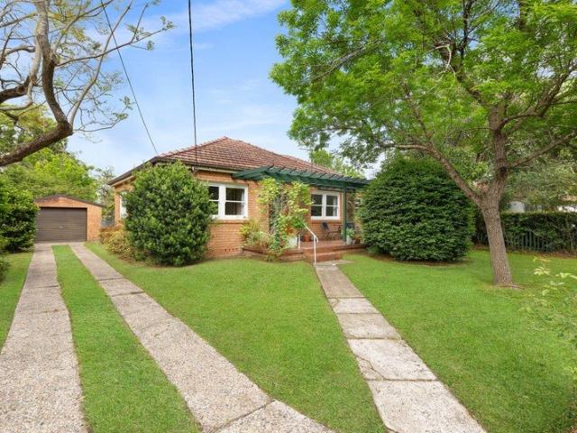 Single level simplicity, a deep backyard and exciting potential