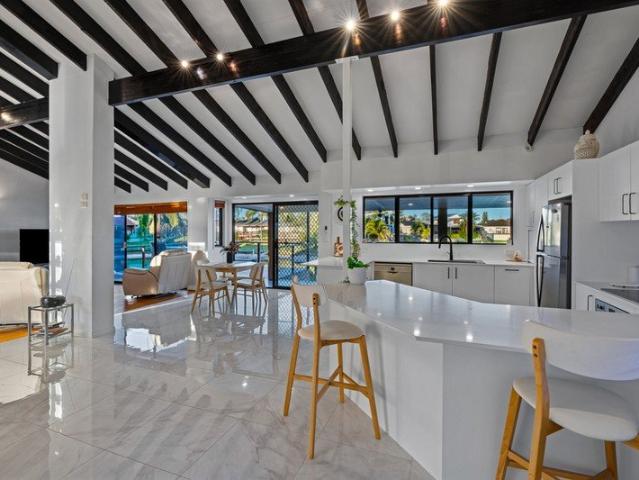 Single Level Waterfront Living East to Water with Skyline Views Owner wants it sold!